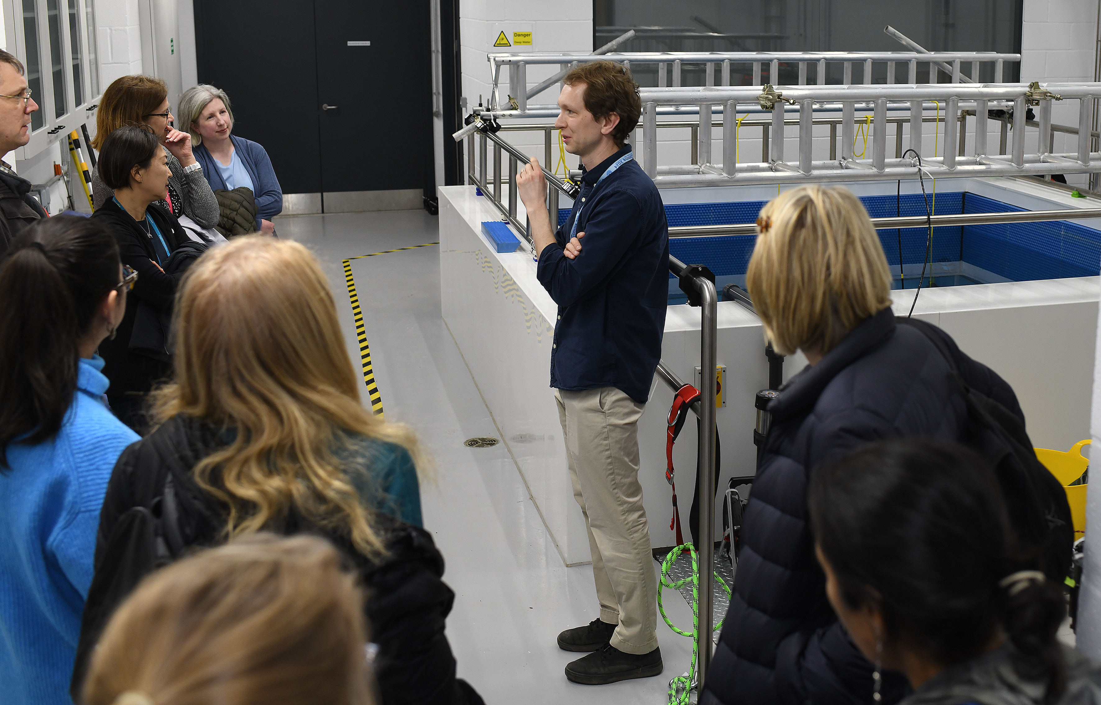 researcher presents research to visitors